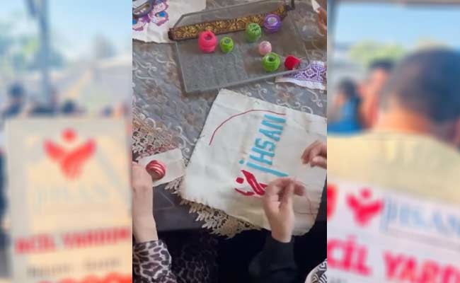 تطريز شعار إحسان للإغاثة بأيدي الغزّيات