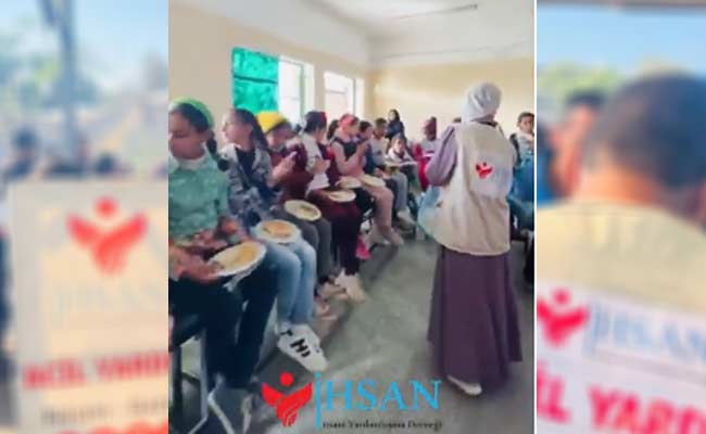 توزبع المناقيش على اطفال غزة وعمل يوم ترفيهي